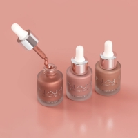 NAM Rozświetlający bronzer-r&oacute;ż w płynie  Blonzing Drops